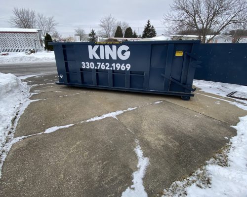 20 Yard dumpster in driveway