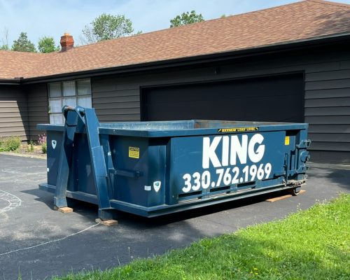 10 yard dumpster in driveway