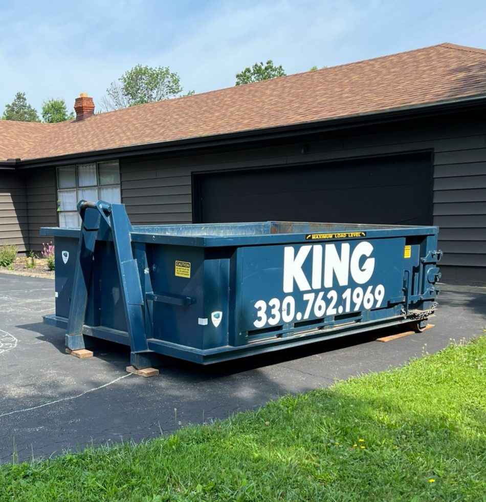 10 yard dumpster in driveway