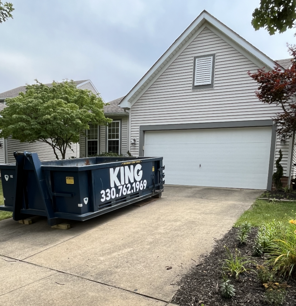 Roll Off Dumpster in Cleveland Driveway